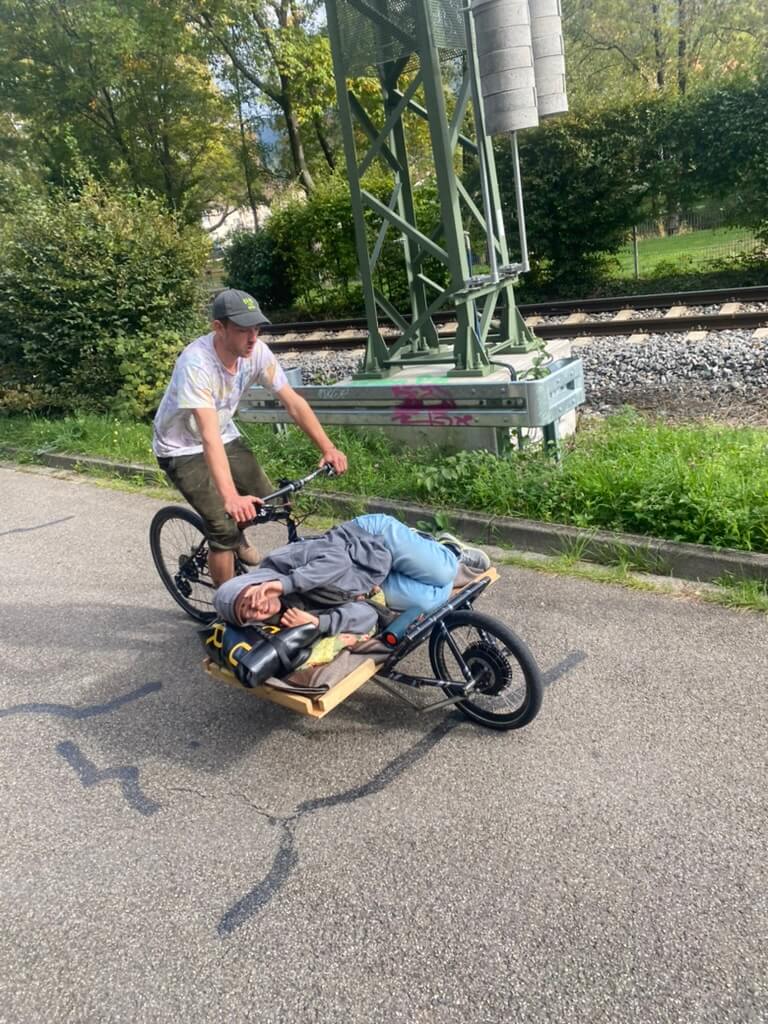 Remy on hara cargo driving beside railway track